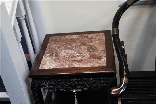 A Chinese hardwood three tier occasional table